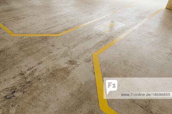 Yellow marking on floor of carpentry factory