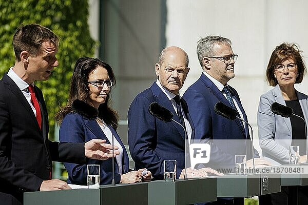 Kai Niebert  President of Deutscher Naturschutzring  Yasmin Fahimi  Chair of the German Trade Union Confederation  Federal Chancellor Olaf Scholz (SPD)  Jörg Dittrich  President of the German Confederation of Skilled Crafts  and Marie Luise Wolf  President of the German Association of Energy and Water Industries  recorded during press statements after the Alliance for Transformation meeting in Berlin  02.06.2023.  Berlin  Germany  Europe