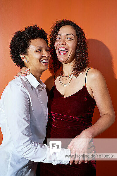 Portrait happy  beautiful lesbian couple laughing and hugging