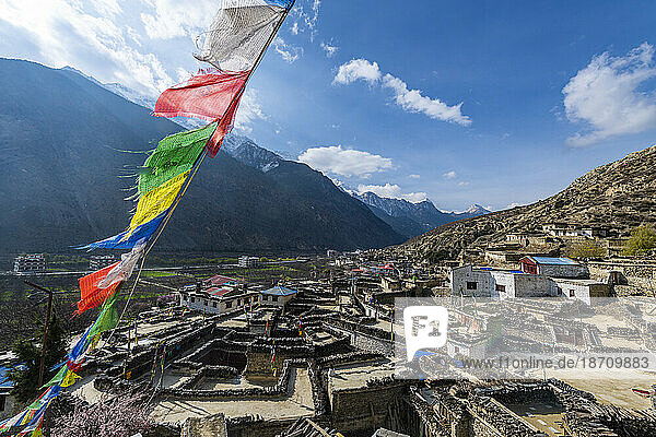 Historical village of Marpha and prayer flags  Jomsom  Himalayas  Nepal  Asia