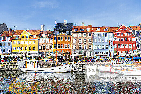 Colorful houses and moored boats in Nyhavn harbour  daytime  Copenhagen  Denmark  Scandinavia  Europe