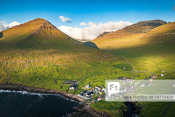 Aerial view of the coastal village of Gjogv and mountains at sunrise  Eysturoy Island  Faroe Islands  Denmark  Europe