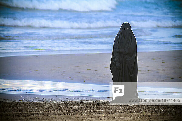 Arab woman on the beach  Bali  Indonesia.