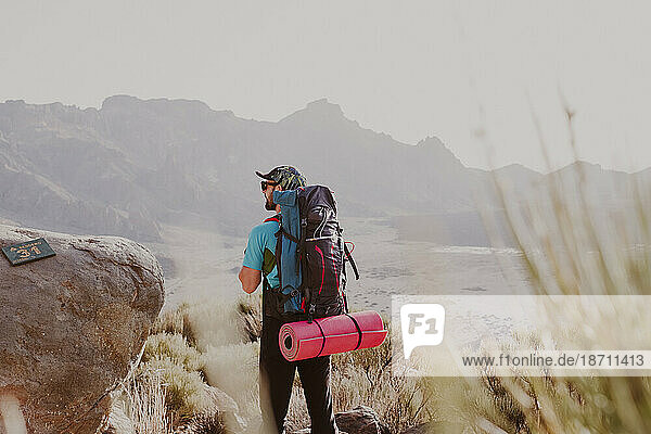A hiker watching the landscape in Guajara Mountain in El Teide
