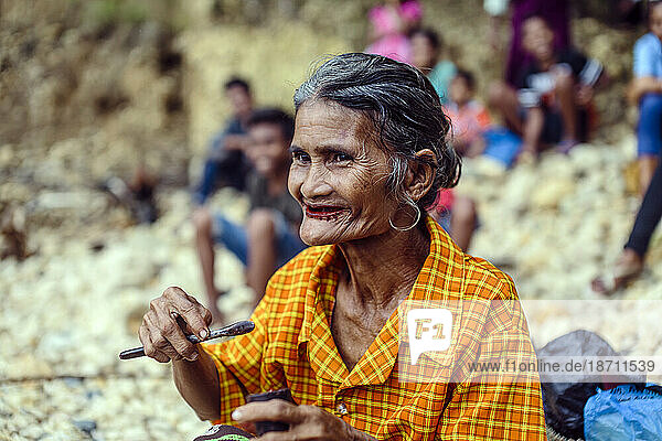 Portrait of woman eating betel nut  Sumba Island  Indonesia