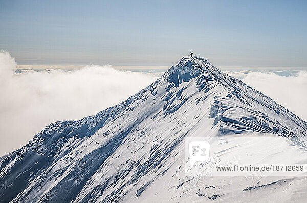Tiny hiker dwarfed by winter summit of katahdin  maine