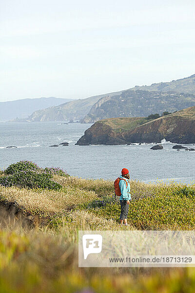 Young woman hiking in the Marin Headlands. Golden Gate National Recreation Area. San Francisco  CA