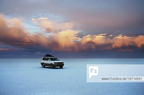 Colorful Clouds Over The Uyuni Salt Flat At Sunset