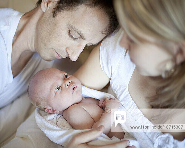 Salmon Arm  BC - A young couple holds their week old daughter - a baby girl  born March 2010 weighing 8 lb.13oz.