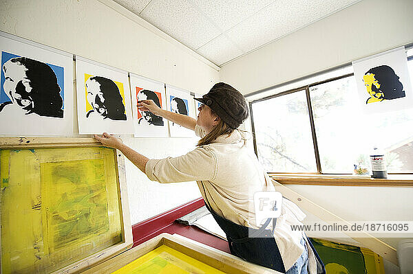 An art student hangs a fresh print to dry at Sierra Nevada College  Lake Tahoe  Nev.