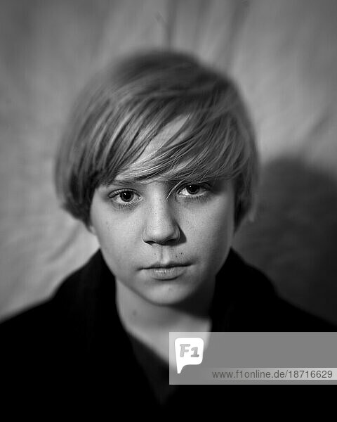 Portrait of a young boy in black & white.