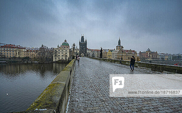 The Karl's bridge in Prague on a cloudy fall day