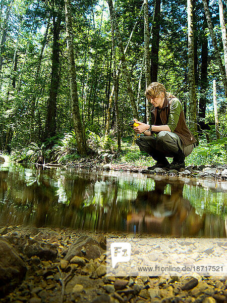 A biologist researching salmon populations in California.