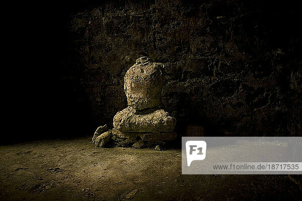 A Mayan God sculpture in lotus position is seen on a building at the ancient Mayan city of Yaxchilan  Chiapas  Mexico