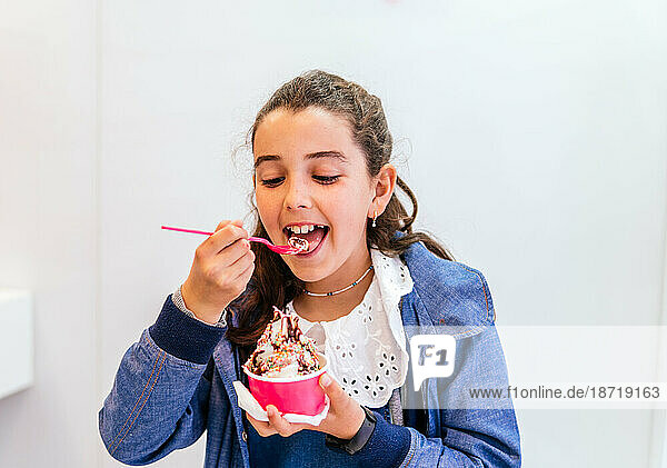 happy girl eating ice cream