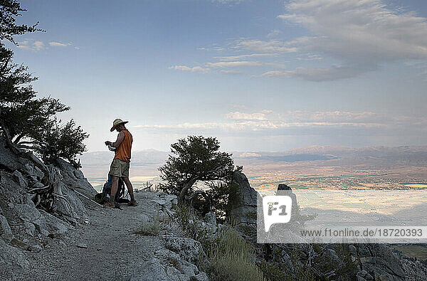 A hiker reads the map along Tahoe Rim Trail.