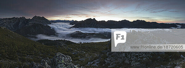 Mists at sunrise from the top of some mountains