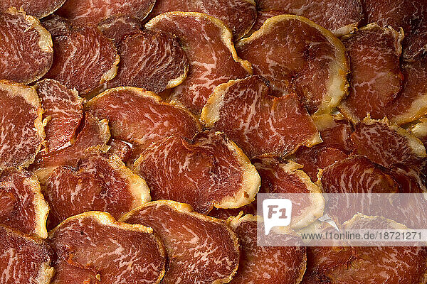 Cured loin slices made from Spanish Iberian pigs.