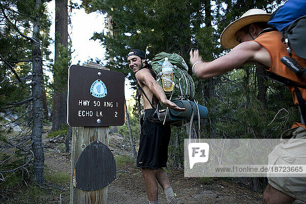 Hikers celebrate as they near the end of 165 mile Tahoe Rim Trail.