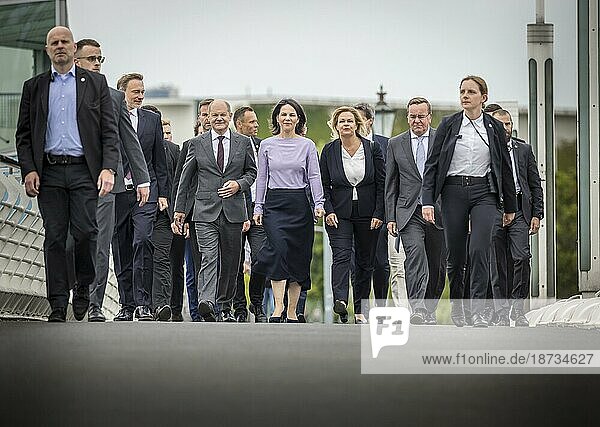 Christian Lindner (FDP)  Federal Minister of Finance  Olaf Scholz (SPD)  Federal Chancellor  Annalena Bärbock (Bündnis 90 Die Grünen)  Federal Minister of Foreign Affairs  Nancy Faeser (SPD)  Federal Minister of the Interior and Home Affairs  and Boris Pistorius (CDU)  Federal Minister of Defence  walk from the Federal Chancellery to the Federal Press Conference to present the National Security Strategy. Berlin  14.06.2023.  Berlin  Germany  Europe