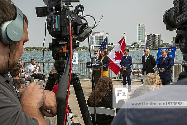 Detroit  Michigan USA  16 May 2023  The United States and Canada announced plans for a binational electric vehicle corridor  with DC fast charging stations every 50 miles from Kalamazoo  Michigan to Quebec City  Quebec. Making the announcement at a dock on the Detroit River (with Canada across the river) were U.S. Transportation Secretary Pete Buttigieg and Canadian Minister of Transport Omar Alghabra  along with Michigan Governor Gretchen Whitmer  IBEW member William Baisden  and Detroit Mayor Mike Duggan