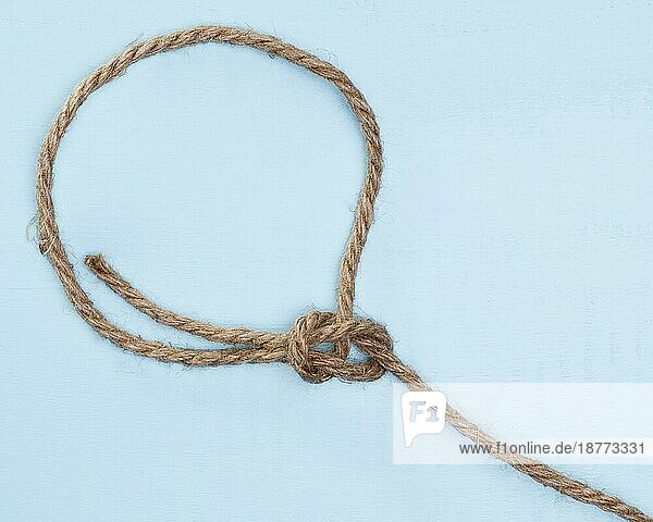 Schnur starkes beiges Seil einfacher Knoten. Foto mit hoher Auflösung