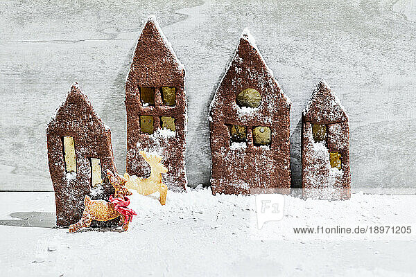 Gingerbread house biscuits in the snow