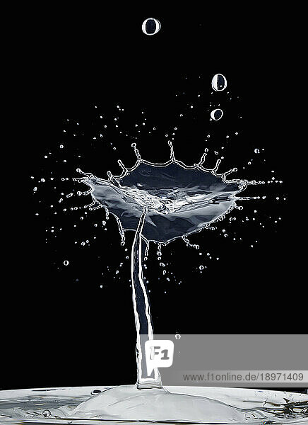 Water splash against a black background