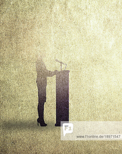 Woman speaking at podium and disappearing