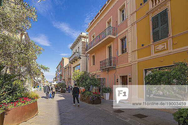 View of shops and restaurant on Corso Umberto I on sunny day in Olbia  Olbia  Sardinia  Italy  Mediterranean  Europe