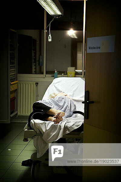 Patient in a night emergency box in a hospital center in France.