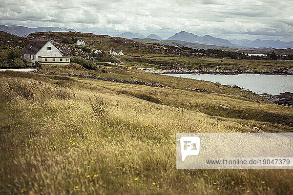 View of houses and mountains in the Scottish highlands