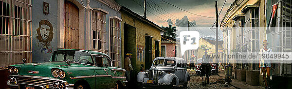Panorama of street with antique cars inTrinidad