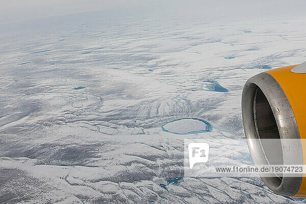 A commercial flight over the Greenland Ice Sheet flying into Kangerlussuaq,  Qeqqata municipality,  Western Greenland,  Polar Regions