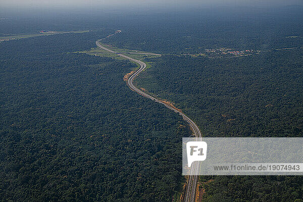 Empty highway in the jungle  future capital Ciudad de la Paz  Rio Muni  Equatorial Guinea  Africa