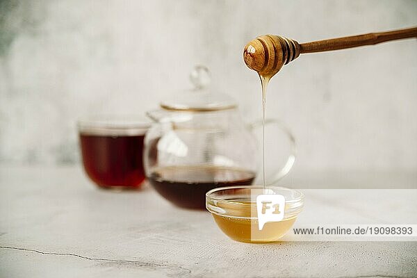 Vorderansicht Tee Honig unscharfer Hintergrund