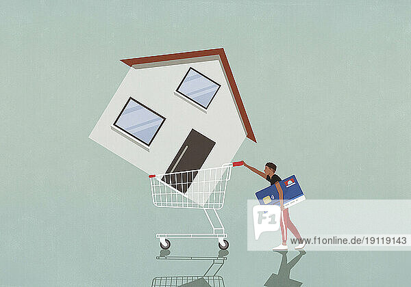 Man with credit card pushing house in shopping cart