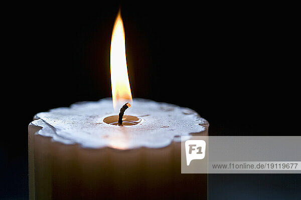 Close up of burning scented candle