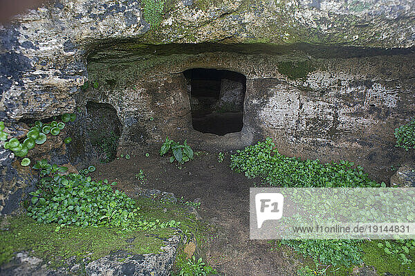 Europe; Italy,  Sardinia,  Sassari,  Alghero,  Anghelo Ruiu Necropolis. Domus de Janas,  pre-Nuragic underground tombs 4200 B.C