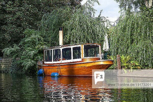 Germany  Hamburg  Wooden steamboat moored along Alster river
