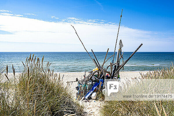 Germany  Schleswig-Holstein  Small beach hut made of wooden poles and garbage