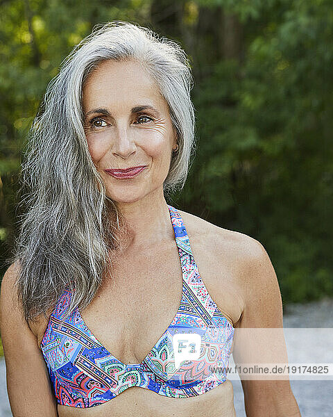 Smiling mature woman with gray hair