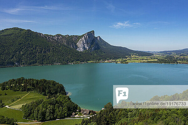Austria  Upper Austria  Drone view of Mondsee lake with Drachenwand mountain in background