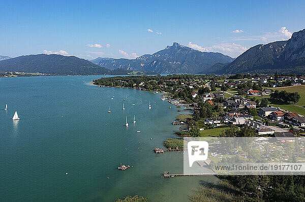 Austria  Upper Austria  Schwarzindien  Drone view of village on shore of Mondsee lake in summer