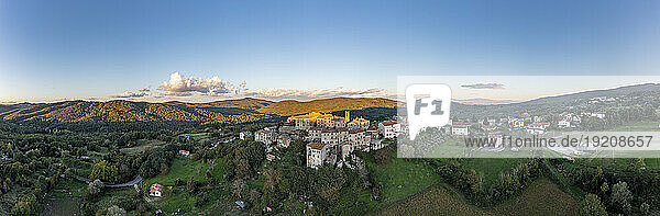 Italy  Tuscany  Torniella  Aerial panorama of mountain village at dusk