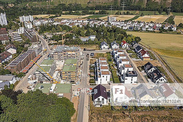 Germany  Baden-Wurttemberg  Ludwigsburg  Aerial view of suburban houses and construction site in new development area