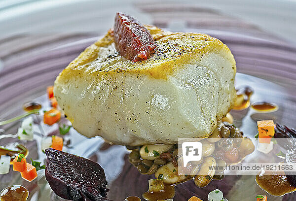 Cod with beetroot  beans and carrots