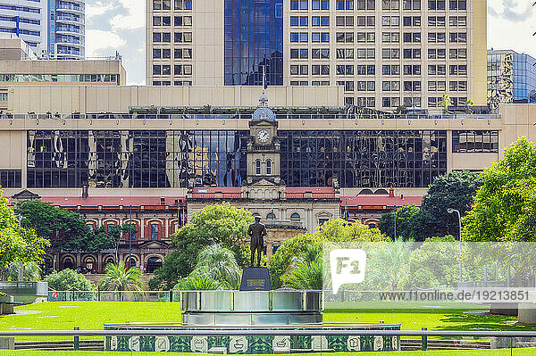 Australia  Queensland  Brisbane  Grand Central Hotel and Central Railway Station with statue in foreground