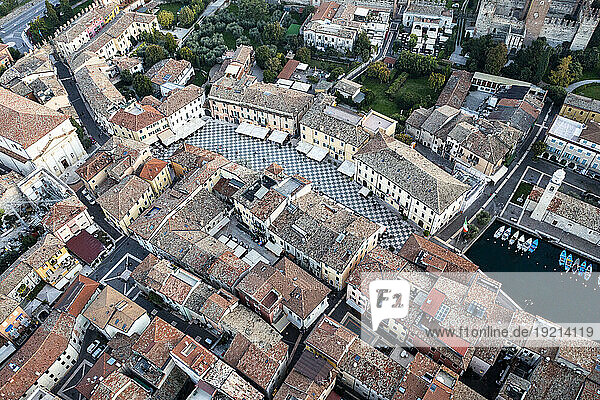 Italy  Veneto  Lazise  Aerial view of town square surrounded by historic houses