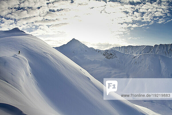 Man Backcountry Skiing In Powder Snow At Wolverine Bowl  Turnagain Pass  Kenai Mountains  Southcentral Alaska  Winter